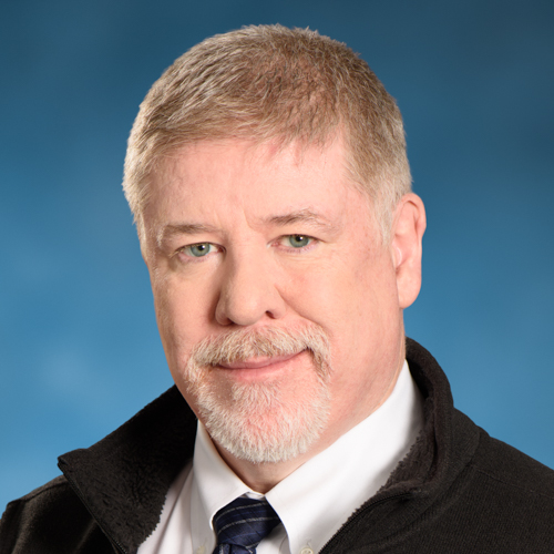 A portrait of William Cotter, President & CEO of Physicians Insurance.